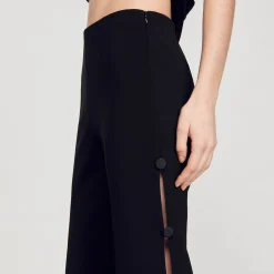 Pantaloni Svasati Traforati Sui Lati
