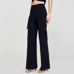 Pantaloni Svasati Traforati Sui Lati